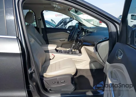 2017 Ford Escape Titanium z USA, uszkodzony, nr VIN 1FMCU0J90HUA04306